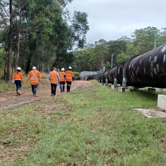 Ground-level view of the Warragamba Pipeline during the restoration program, showcasing Diona's commitment to eco-friendly practices and infrastructure sustainability.