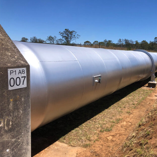 Ground-level view of the Warragamba Pipeline during the restoration program, showcasing Diona's commitment to eco-friendly practices and infrastructure sustainability.