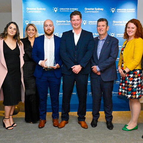 Diona team proudly receiving the Greater Sydney Commission Planning Award.