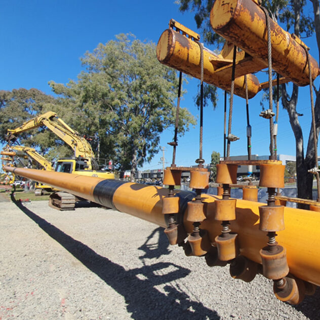 Machinery operating on the Murarrie Looping Project, laying pipes under the Brisbane River.